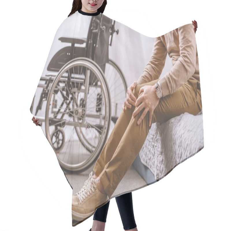 Personality  Cropped Image Of Man With Disability Sitting On Bed And Touching Legs Hair Cutting Cape