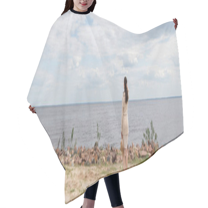 Personality  Full Length Of Brunette Young Woman Holding Sun Hat And Standing Near Sea, Banner Hair Cutting Cape