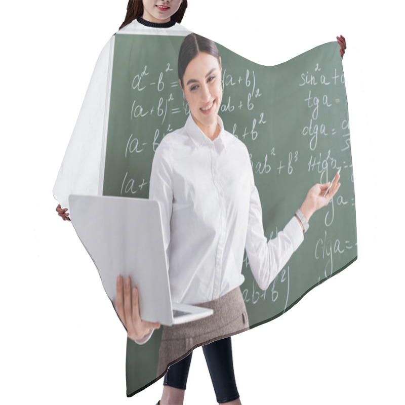 Personality  Smiling Teacher Having Video Call On Laptop Near Chalkboard In Classroom  Hair Cutting Cape