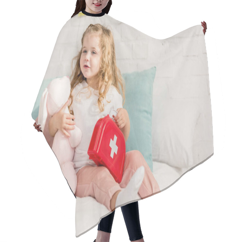 Personality  Adorable Kid Holding First Aid Kit And Rabbit Toy In Children Room, Looking Away Hair Cutting Cape