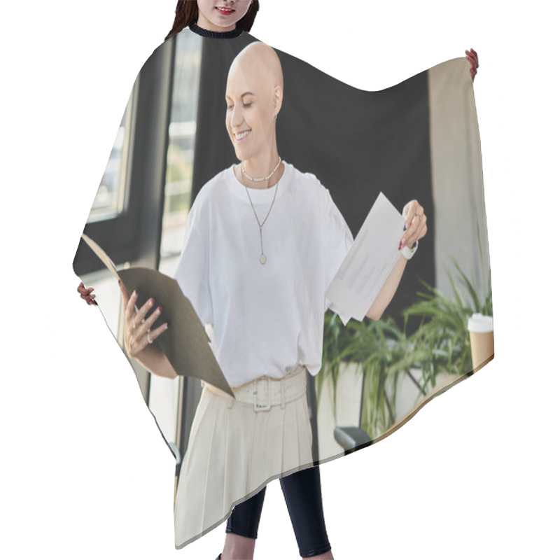 Personality  A Young Bald Woman In Elegant Attire Smiles As She Reviews Important Documents At Work. Hair Cutting Cape