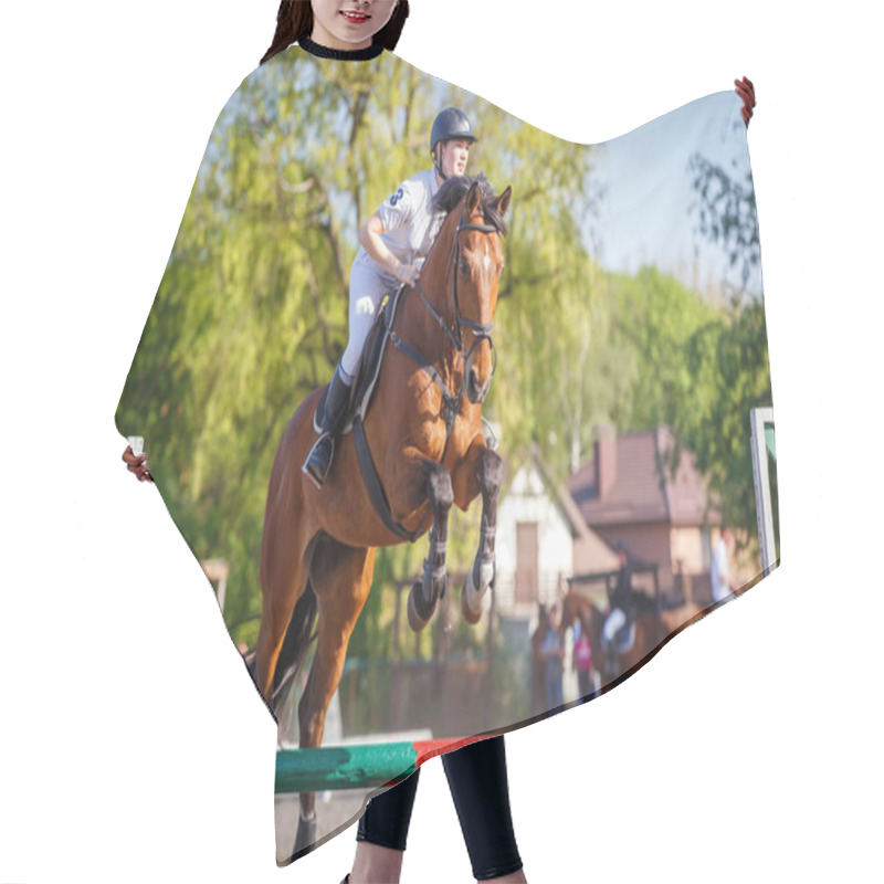 Personality  Young Rider Horseback Woman Jumping Over The Hurdle In Showjumping Competition. Hair Cutting Cape