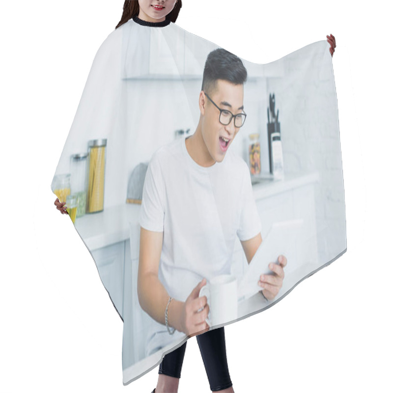 Personality  Cheerful Young Asian Man In Eyeglasses Using Digital Tablet Hair Cutting Cape