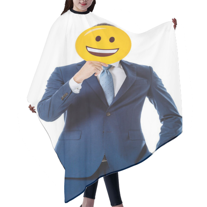 Personality  KYIV, UKRAINE - AUGUST 12, 2019: Businessman In Blue Suit Holding Happy Smiley In Front Of Face Isolated On White Hair Cutting Cape