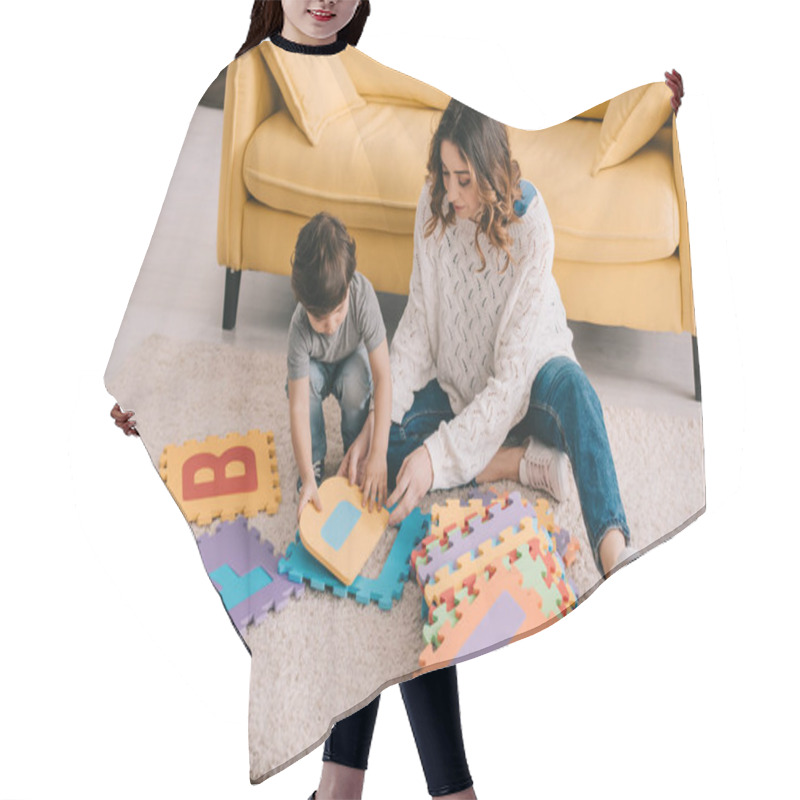 Personality  Mother And Son Playing With Alphabet Puzzle Mat On Carpet Hair Cutting Cape