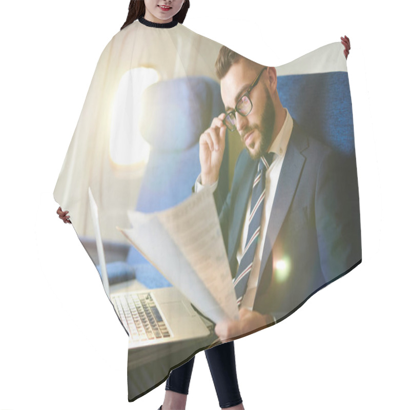 Personality  Side View Portrait  Of Handsome Bearded Businessman Reading Document And Working While Enjoying Flight In First Class, Copy Space Hair Cutting Cape