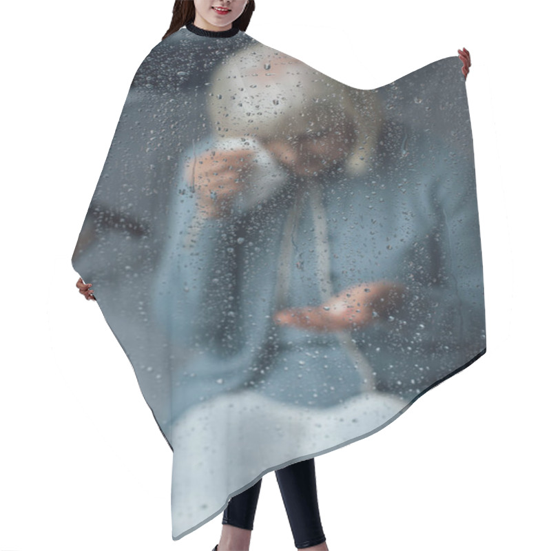 Personality  Senior Woman Sitting On Bed And Wiping Tears With Handkerchief At Home Through Window With Raindrops Hair Cutting Cape