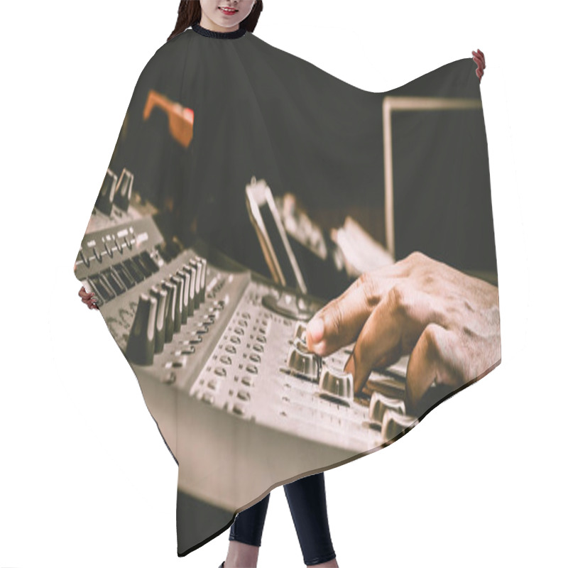 Personality  Sound Engineer Hand Adjusting Audio Level On Digital Mixing Console Fader In Recording, Broadcasting Studio Hair Cutting Cape