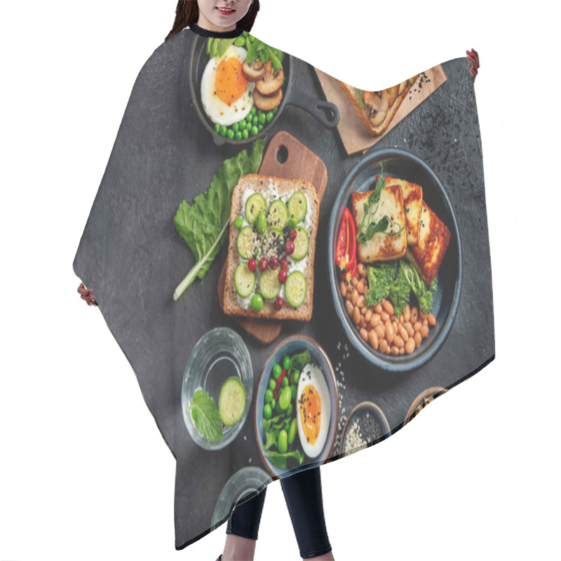 Personality  Tasty Food With Avocado Toast, Vegetables, Eggs On Dark Background. Helthy Breakfast Concept. Top View, Copy Space. Hair Cutting Cape