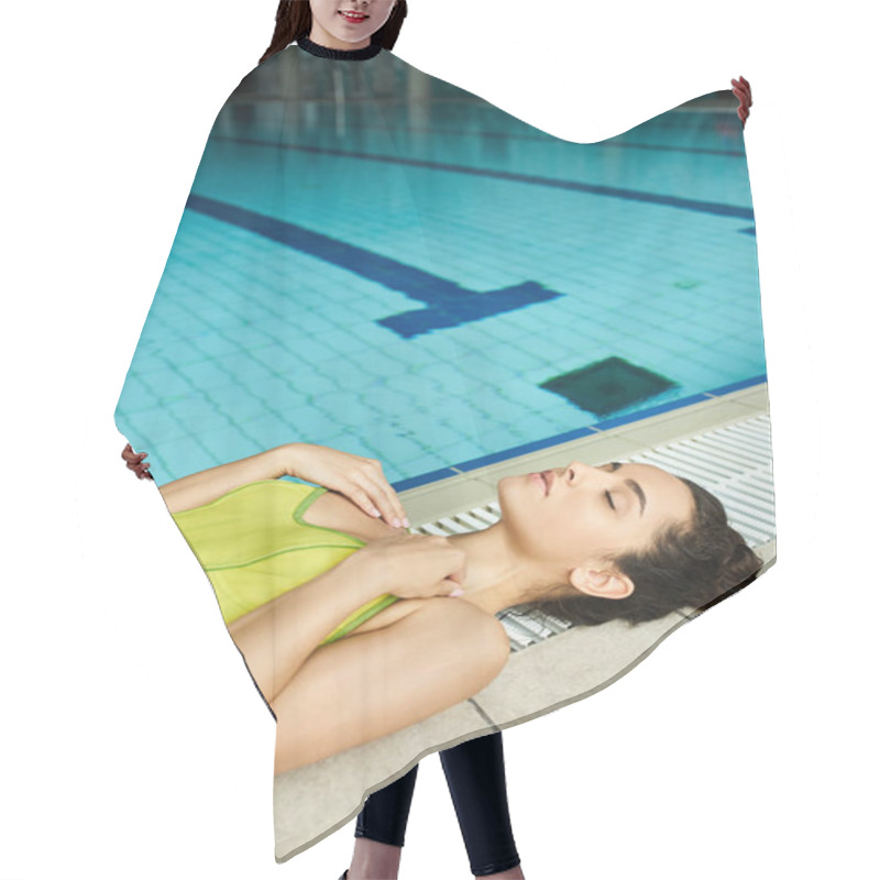 Personality  A Young Brunette Woman In A Yellow Dress Reclines Gracefully By The Side Of An Indoor Swimming Pool. Hair Cutting Cape