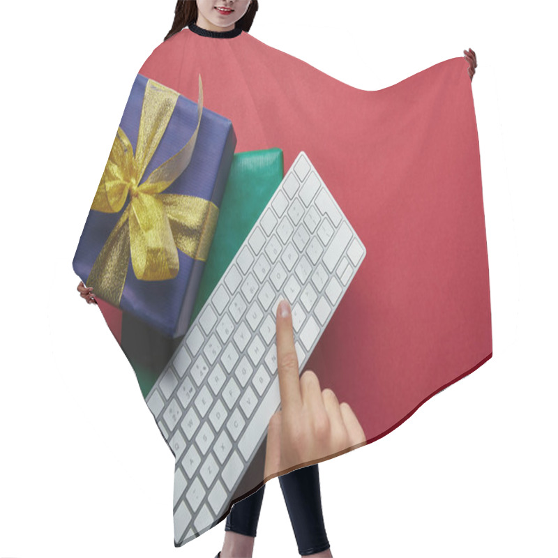 Personality  Top View Of Man Pushing Button On Computer Keyboard Near Wrapped Presents On Red Background  Hair Cutting Cape