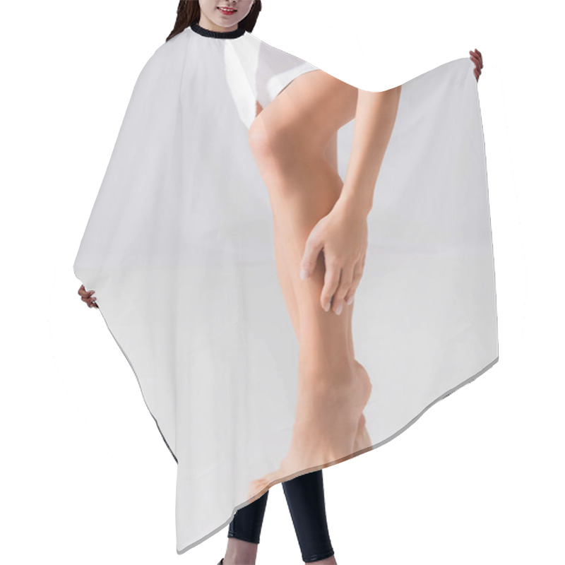 Personality  Partial View Of Barefoot Young Woman Wrapped In Towel Applying Body Lotion On White Hair Cutting Cape