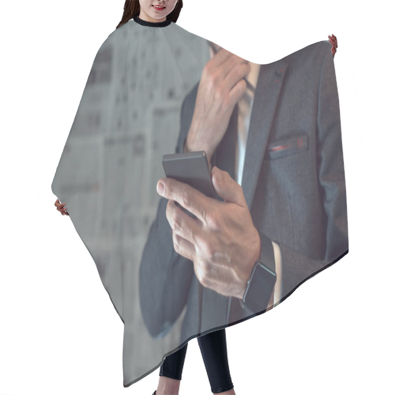 Personality  Businessman Using Mobile Phone In Fake News Infodemic Concept With Tabloid Newspaper Pages In Background Hair Cutting Cape