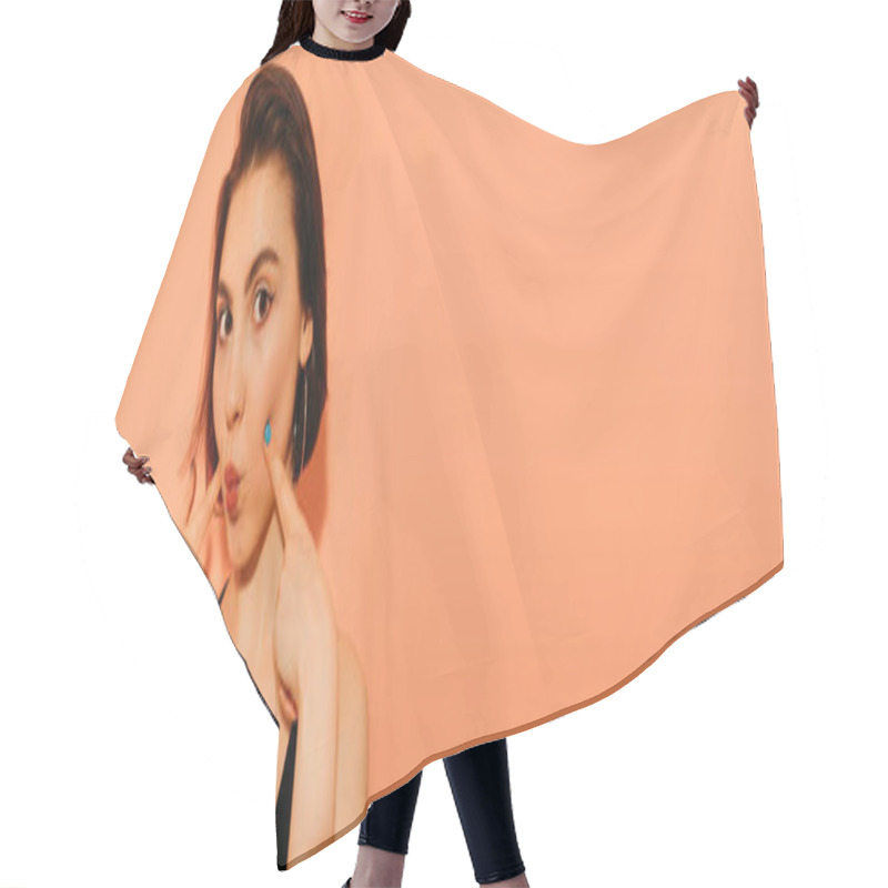 Personality  Young Woman Grimacing With Pouting Lips And Hands Near Face On Orange Background, Banner Hair Cutting Cape