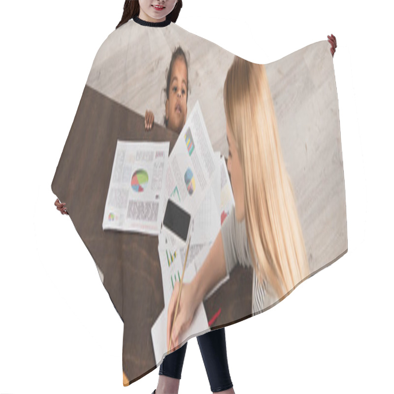 Personality  High Angle View Of Woman Working From Home Near Adopted African American Daughter, Banner Hair Cutting Cape