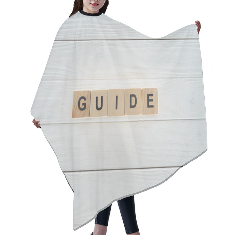 Personality  Top View Of Guide Word Made Of Wooden Blocks On White Wooden Surface Hair Cutting Cape