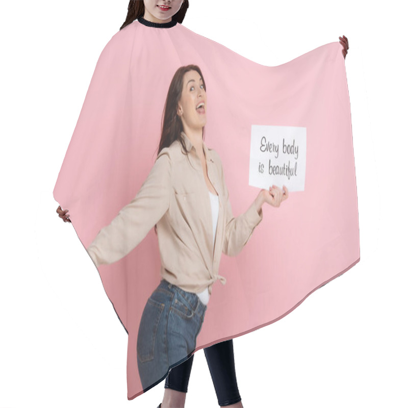 Personality  Happy Woman Pointing With Finger On Butt While Holding Card With Every Body Is Beautiful Lettering On Pink Background Hair Cutting Cape