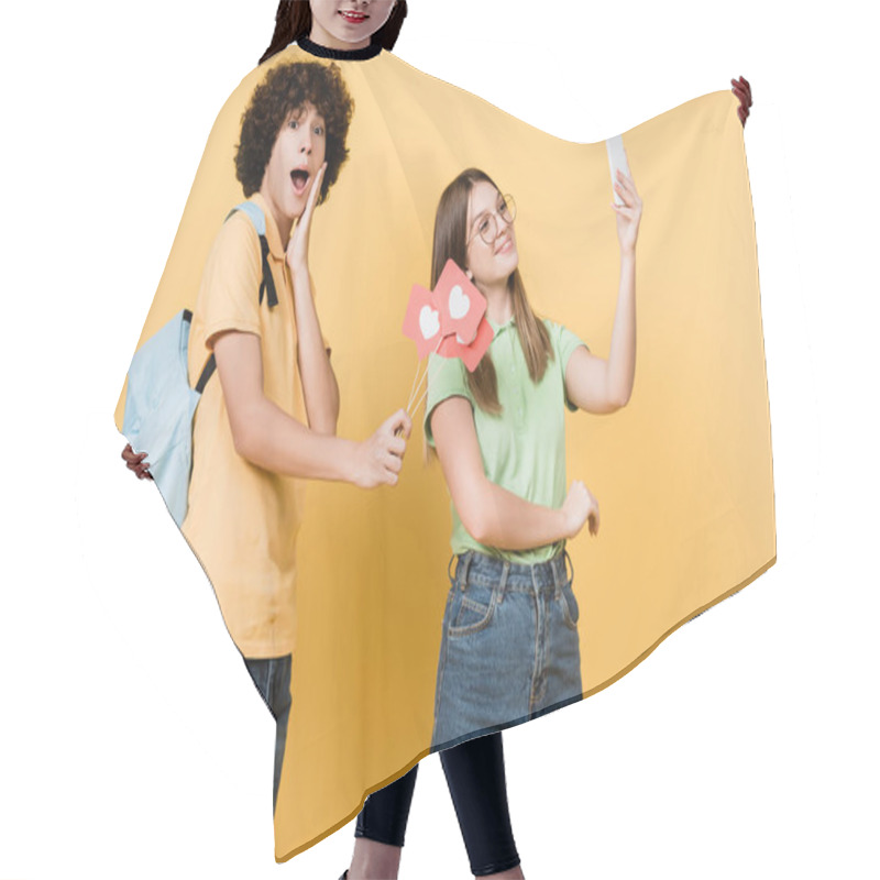 Personality  Excited Teenager Holding Paper Hearts On Sticks Near Smiling Friend Taking Selfie On Yellow Background Hair Cutting Cape