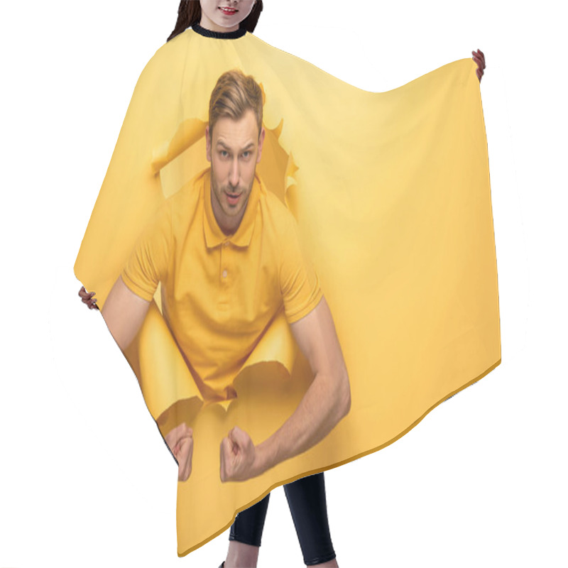 Personality  Strong Handsome Man In Yellow Outfit Showing Biceps In Yellow Paper Hole  Hair Cutting Cape