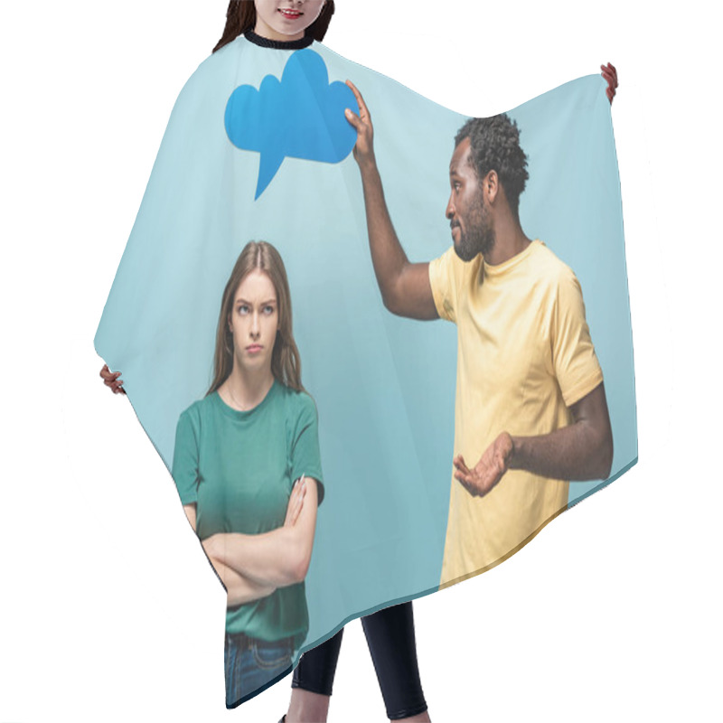 Personality  African American Man Holding Thought Bubble Above Offended Girlfriend On Blue Background Hair Cutting Cape