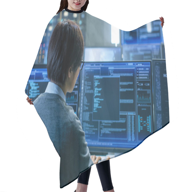 Personality  In The System Control Room Technical Operator Works At His Workstation With Multiple Displays Showing Graphics. IT Technician Works On Artificial Intelligence, Big Data Mining, Neural Network Project. Hair Cutting Cape