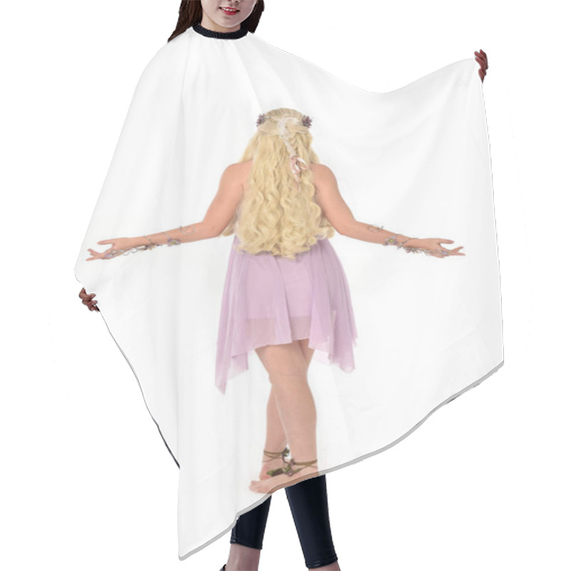 Personality  Full Length Portrait Of Blonde Girl Wearing Purple Dress, Standing Pose With Back To The Camera. Isolated On White Background. Hair Cutting Cape