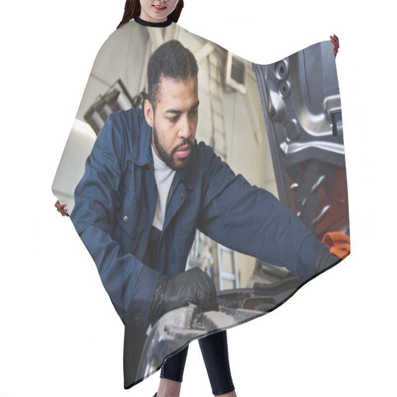 Personality  Dedicated Young Mechanic Focuses On Maintaining A Car In A Lively Repair Shop Setting. Hair Cutting Cape