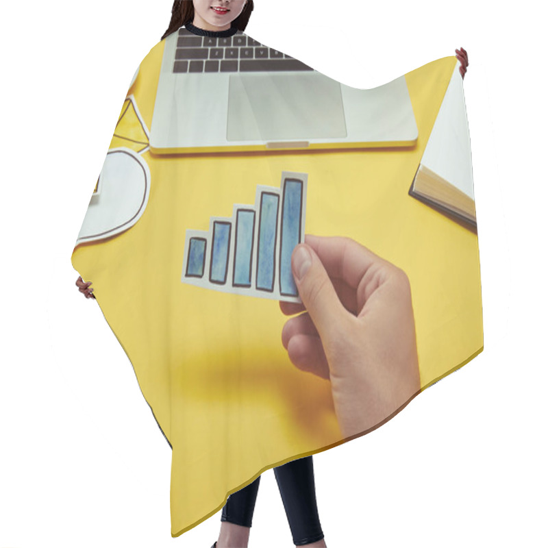 Personality  Cropped Image Of Man Holding Paper Chart Sign Near Laptop Hair Cutting Cape