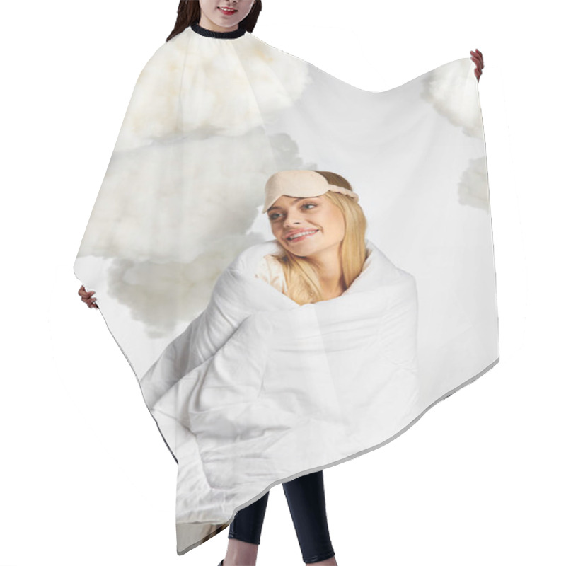 Personality  A Dreamy Blonde Woman In Cozy Pyjamas Smiles While Wrapped In A Blanket. Hair Cutting Cape