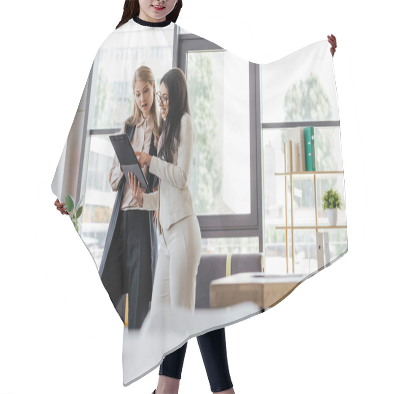 Personality  Selective Focus Of Attractive Businesswomen Looking At Clipboard  Hair Cutting Cape