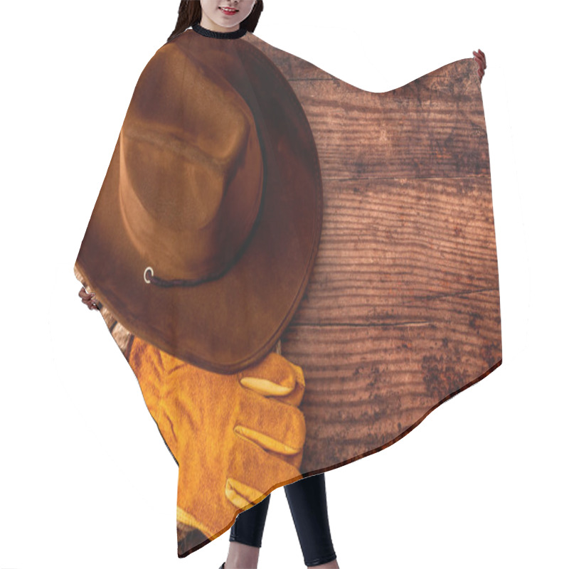 Personality  American Culture, Living On A Ranch Or Farm And Country Muisc Concept Theme With A Cowboy Hat, Rope Lasso And Rodeo Leather Gloves On A Wooden Background In A Old Saloon With Copy Space Hair Cutting Cape