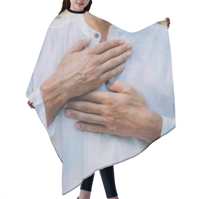 Personality  Reiki Spiritual Self-treatment Healing Session. Man Holding Hands Above The Heart Chakra.   Hair Cutting Cape