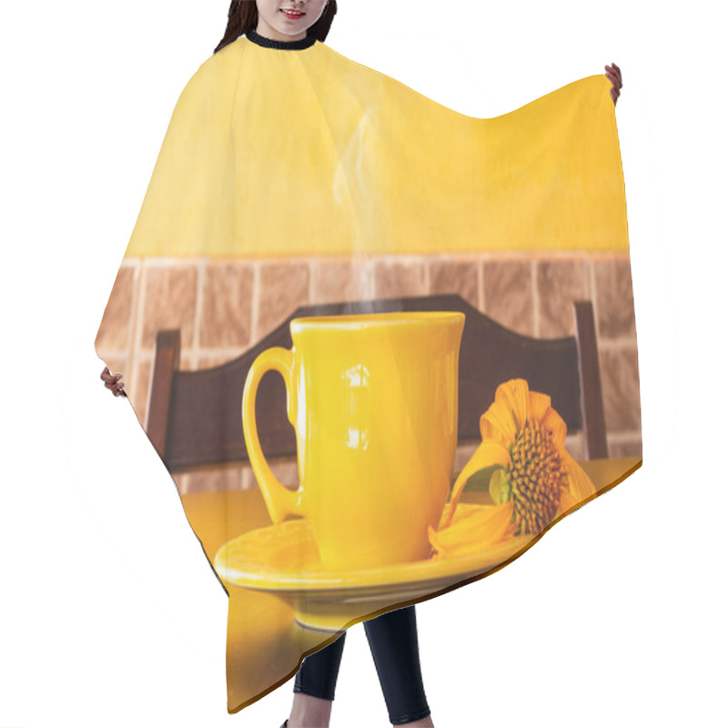 Personality  A Yellow Cup Full Of Coffee, With A Saucer And A Wilted Sunflower, On A Wooden Table With A Chair Back In The Background. Hair Cutting Cape