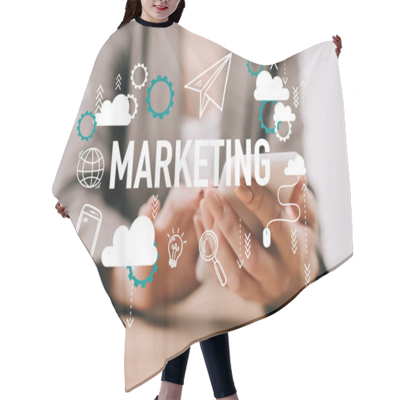 Personality  Cropped View Of Businesswoman Using Smartphone In Office With Marketing Icons Hair Cutting Cape