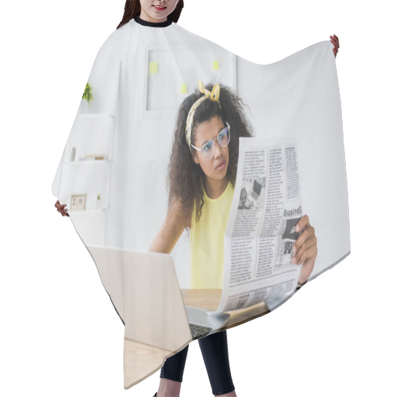 Personality  Attractive African American Woman Reading Travel Newspaper Near Laptop  Hair Cutting Cape