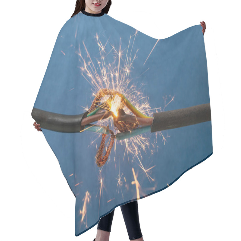 Personality  Sparks Explosion Between Electrical Cables, On Blue Background, Fire Hazard Concept  Hair Cutting Cape