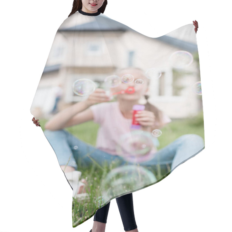 Personality  Little Child With Soap Bubbles Sitting On Lawn While Her Mother Standing Behind In Front Of House  Hair Cutting Cape