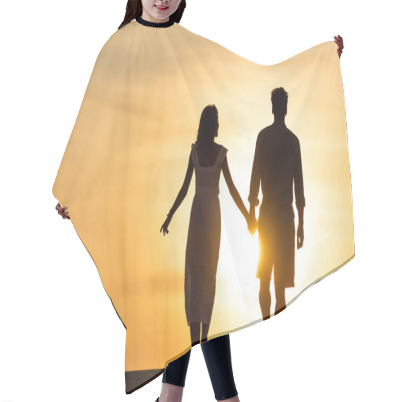 Personality  Silhouettes Of Man And Woman Holding Hands While Walking On Beach Against Sun During Sunset Hair Cutting Cape