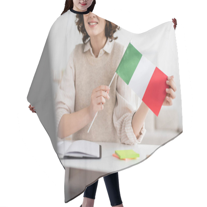 Personality  Partial View Of Smiling Language Teacher Holding Flag Of Italy During Online Lesson On Blurred Laptop At Home Hair Cutting Cape