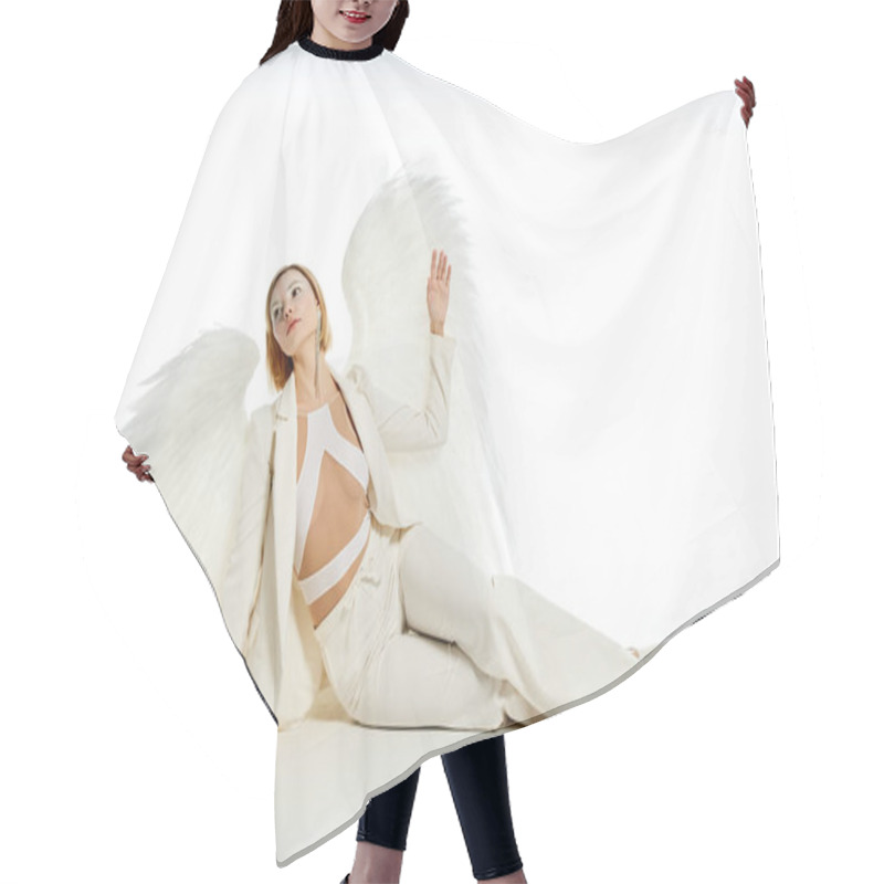 Personality  Full Length Of Charming Woman In Costume Of Heavenly Angel With Wings Sitting On White Backdrop Hair Cutting Cape