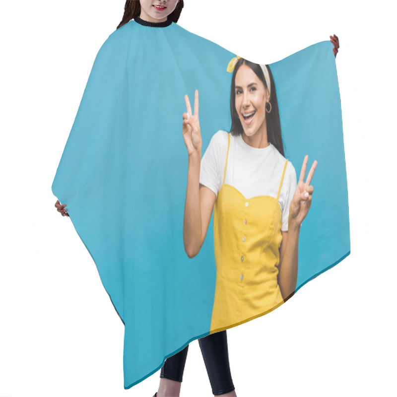 Personality  Happy Woman Woman Showing Peace Signs Isolated On Blue  Hair Cutting Cape