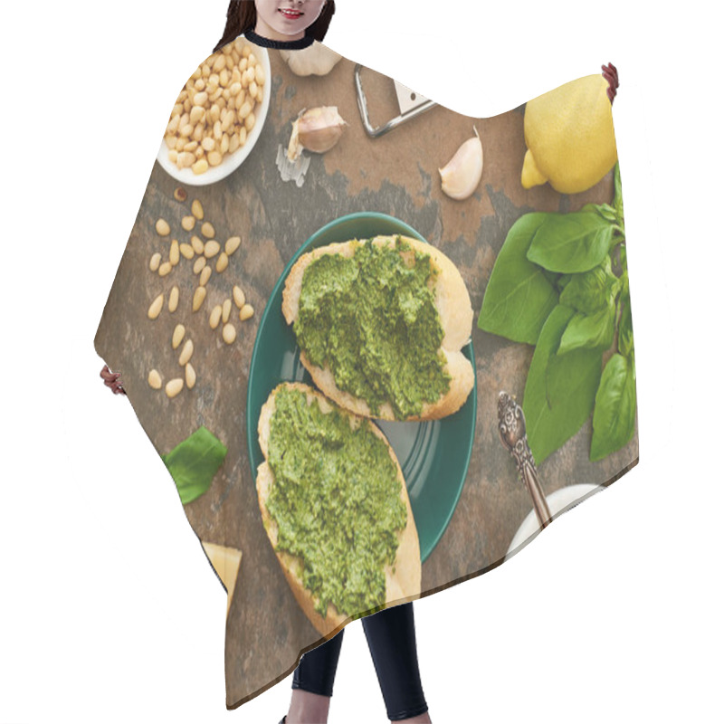 Personality  Top View Of Baguette Slices With Pesto Sauce On Plate Near Fresh Ingredients And Cooking Utensils On Stone Surface Hair Cutting Cape