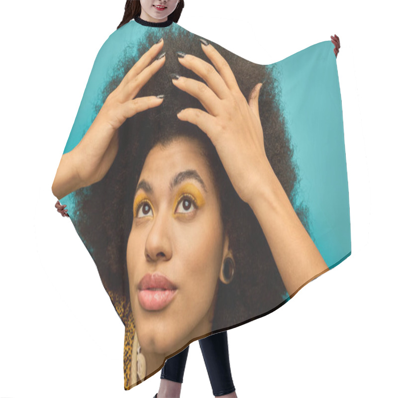 Personality  African American Woman Holding Hair In Front Of Face. Hair Cutting Cape