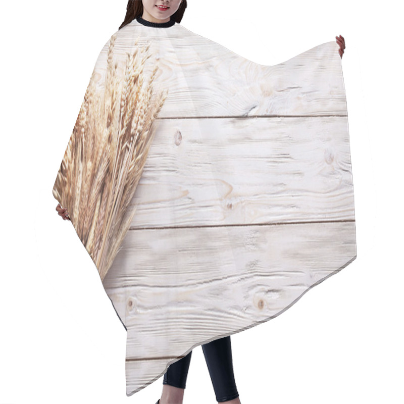 Personality  Ears Of Wheat On Old Wooden Table. Hair Cutting Cape