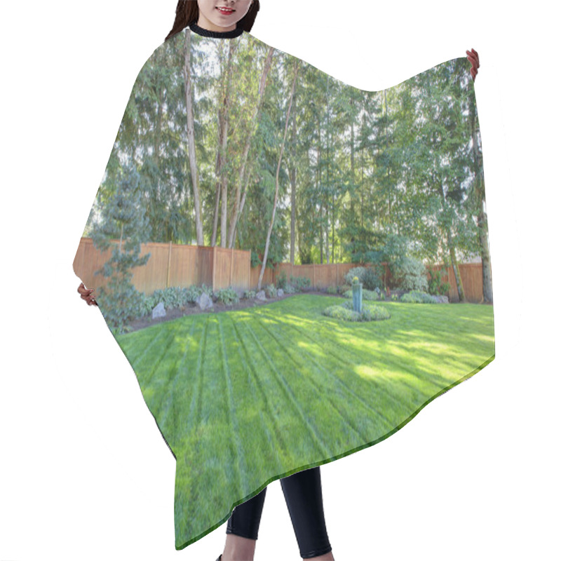 Personality  Large Fenced Back Yard With Green Grass Hair Cutting Cape