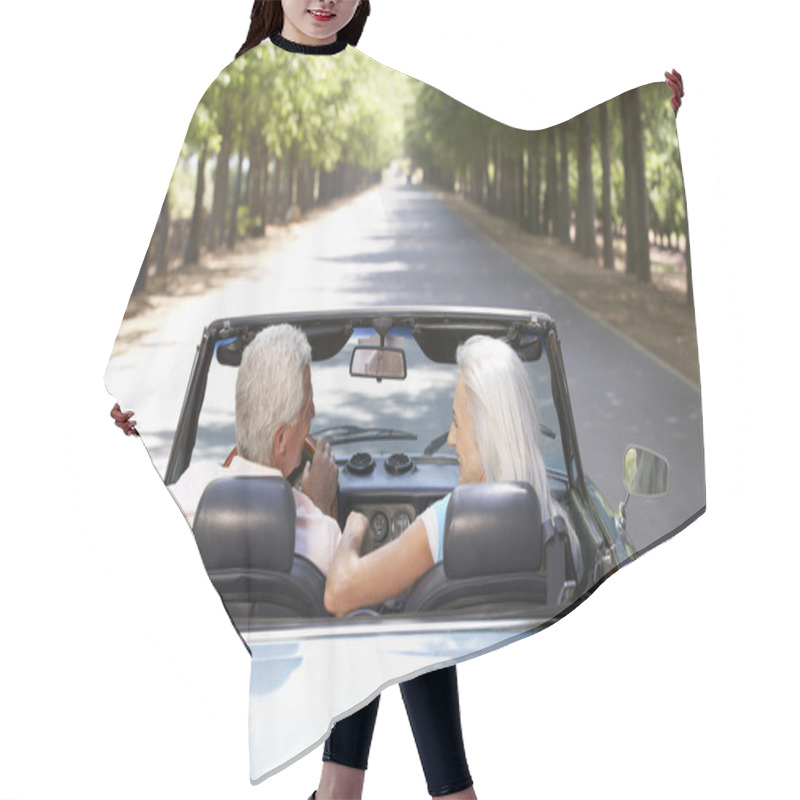 Personality  Senior Couple In Sports Car Hair Cutting Cape