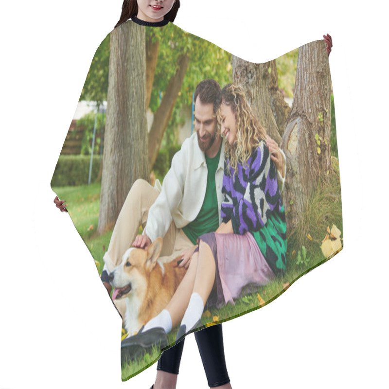 Personality  Happy Man Hugging Curly Woman In Cute Outfit While Cuddling Corgi Dog In Park, Sitting Near Tree Hair Cutting Cape