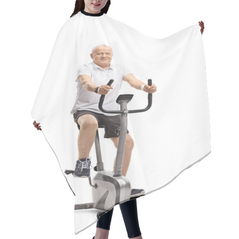 Personality  Mature Man Working Out On A Stationary Bike Isolated On White Background Hair Cutting Cape