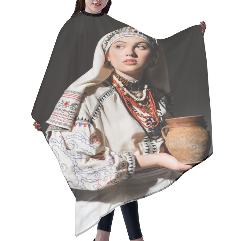 Personality  Portrait Of Pretty Ukrainian Woman In Traditional Clothing With Ornament Holding Clay Pot On Black Hair Cutting Cape