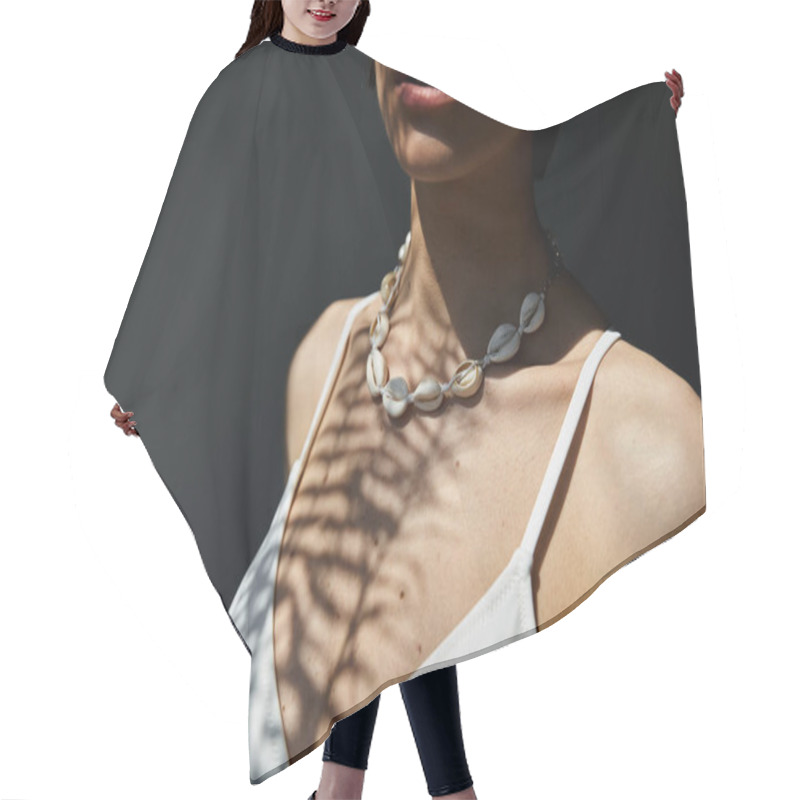 Personality  A Woman Adorned In A Stylish Seashell Necklace Poses Gracefully. Hair Cutting Cape